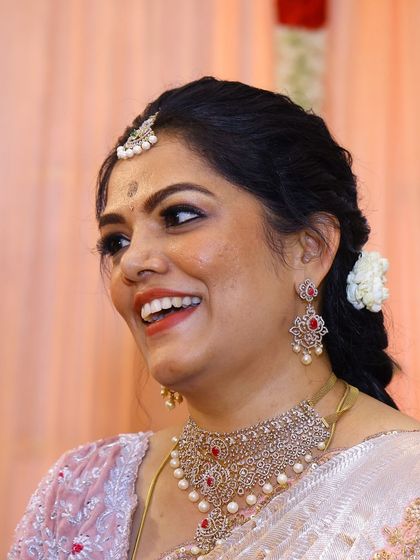 Photos from my housewarming, wearing a saree and blouse I designed myself. I took a plain tissue saree and completely transformed it with a hand-worked scalloped border and a custom-stitched velvet blouse. It’s a look that’s very close to my heart.