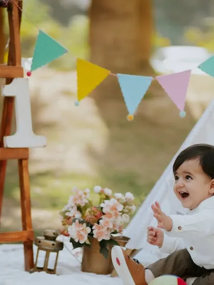 A playful, candid moment from the picnic session. The natural setting allows for lots of movement and authentic interactions.