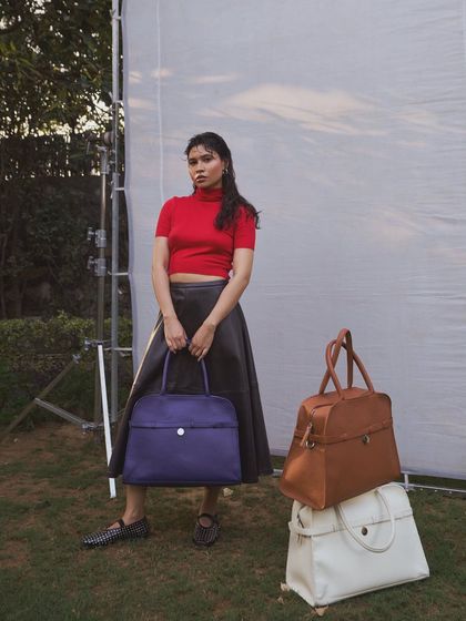 Our Carryall totes in three stunning colors: Parisian Blue, Pebbled Terra, and Pebbled White. These giant totes are perfect for the season, offering room for layers, memories, and moments.