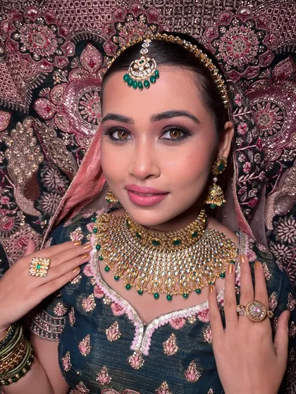 A full-face portrait showing the final, polished bridal makeup from one of my workshops.