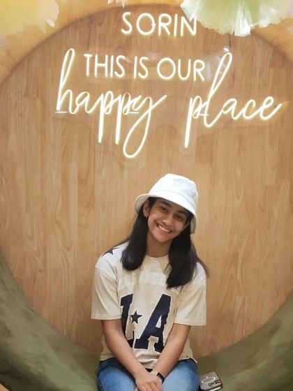 A young guest looking happy and confident after her visit. It's a joy to see clients of all ages feel good about themselves.