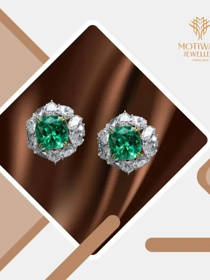 Classic elegance. These stud earrings feature magnificent cushion-cut emeralds, each surrounded by a halo of brilliant diamonds, showcasing the timeless beauty of this precious gemstone.