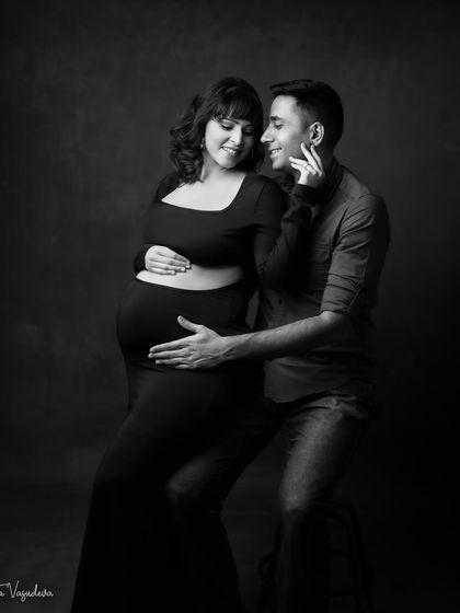 The intimacy of this couple's pose is beautifully enhanced in black and white. It's a tender, soulful moment.