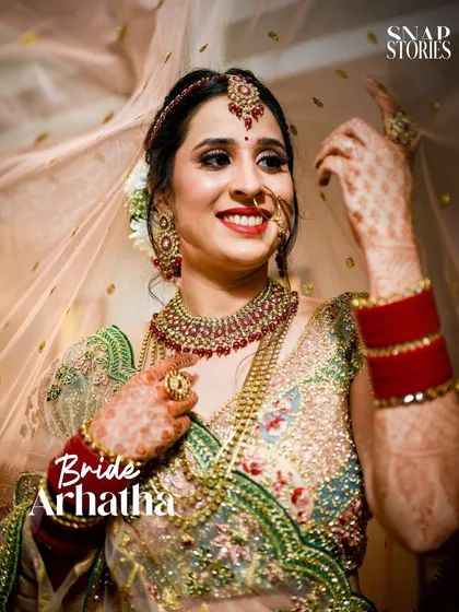 A stunning bridal portrait, with the veil creating a soft and romantic frame around her face. We use elements of the bridal attire to enhance our photos.