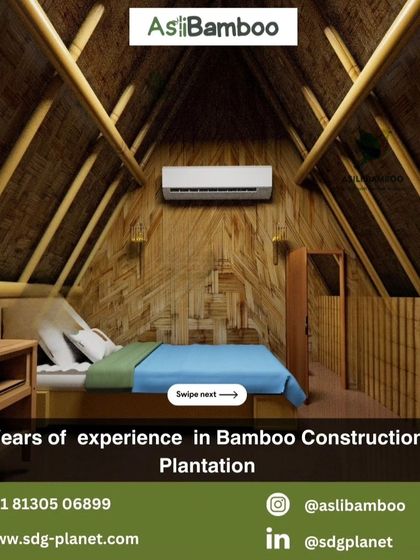 The interior of one of our bamboo cottages, featuring bamboo-paneled walls and an exposed-beam ceiling. These structures are designed to be beautiful, functional, and naturally cooling.