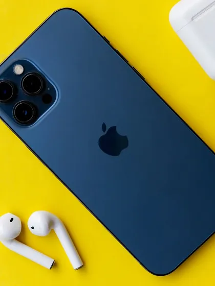 A bold and simple shot of a blue iPhone and AirPods against a bright yellow background. The high-contrast colors make the products pop, creating a modern and energetic visual.
