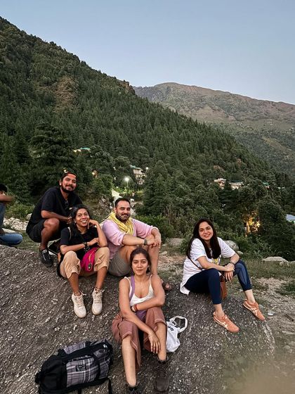 A group photo from our spiritual mountain excursion. We take time to rest, connect, and soak in the incredible views during our daily hikes and walks.
