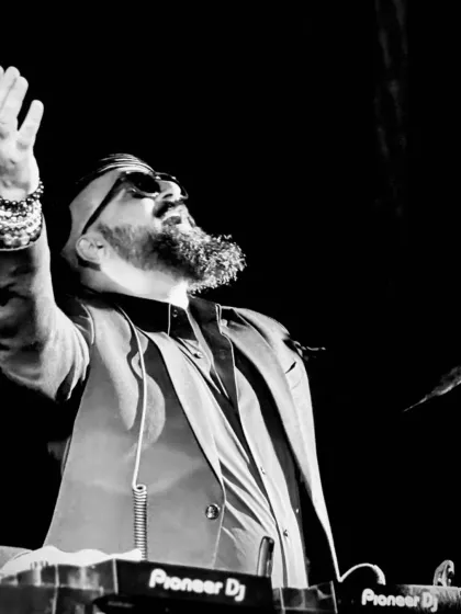 A moment of pure connection with the music. My hands in the air, feeling the energy of the crowd and the power of the sound.