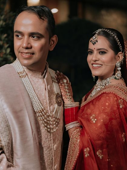 A heartwarming photo of the bride and groom. Her makeup looks flawless and natural, perfect for creating cherished memories.