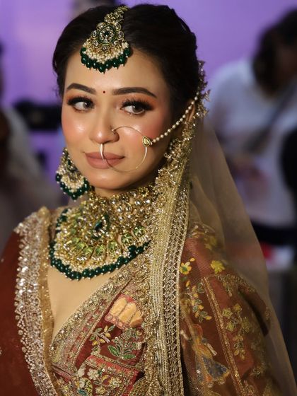 A full-length shot of the bridal look created at the beauty expo. The lehenga and jewelry are from my own couture rental collection.
