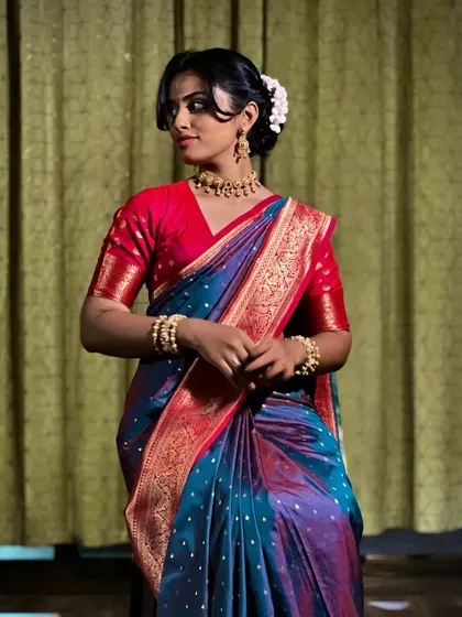 Confidence comes from a perfect drape. This look showcases a secure and flattering fit around the torso, with a neatly pinned pallu that stays in place. My draping ensures you can interact and pose with confidence.