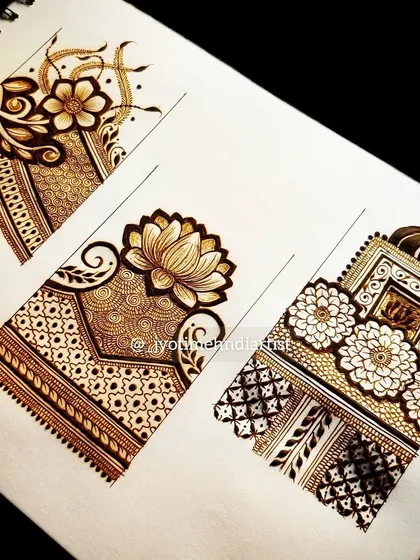 A practice sheet showing three different floral startup designs, from simple vines to more complex architectural patterns.