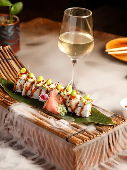 Our sushi is presented with dramatic flair, often with smoke, to enhance the sensory experience. This is not just food; it's a show.