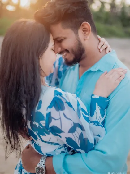 Sometimes, the most powerful photos are the quietest. This intimate close-up from a beach pre-wedding session focuses entirely on the couple's connection and the happy, peaceful feeling of being together.