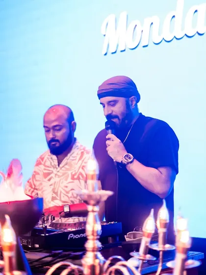 On the mic with a fellow artist at Happy Brew. We often have live performers join the set to elevate the 'Mondaze' experience.