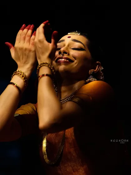 This is an expression of pure devotion and spiritual ecstasy during a performance. It represents 'Bhakti' rasa, a feeling of deep connection to the divine.