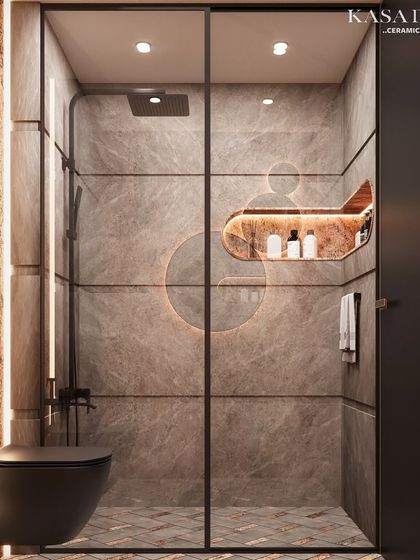 This walk-in shower demonstrates a complete surface solution. The walls are clad in large-format grey marble-effect tiles, while the accent wall features our textured Red Ruptura stone. The floor is a custom fusion of tile and marble, and the backlit, recessed shelving adds both function and a warm, ambient glow.