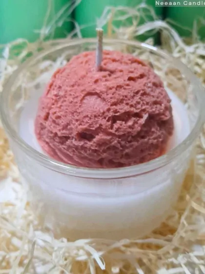 A perfect scoop of strawberry ice cream that never melts. This fun jar candle is a treat for the eyes and the nose, adding a playful and sweet touch to any room. It’s a delightful piece that looks just like a real dessert.