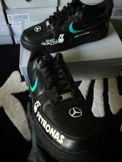 A front view of the Lewis Hamilton custom sneakers, featuring the Petronas logo.