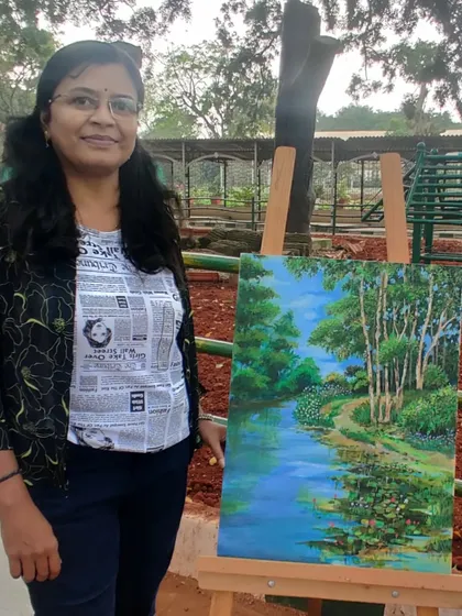 Posing with my finished painting of the Lalbagh lake, right where it was created.