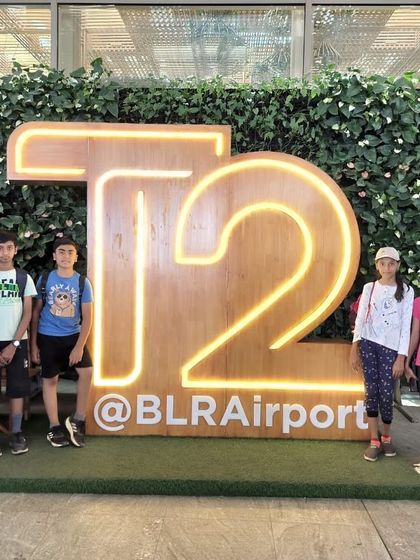 Another group of aspiring aviators enjoys their educational visit to the Bengaluru airport.