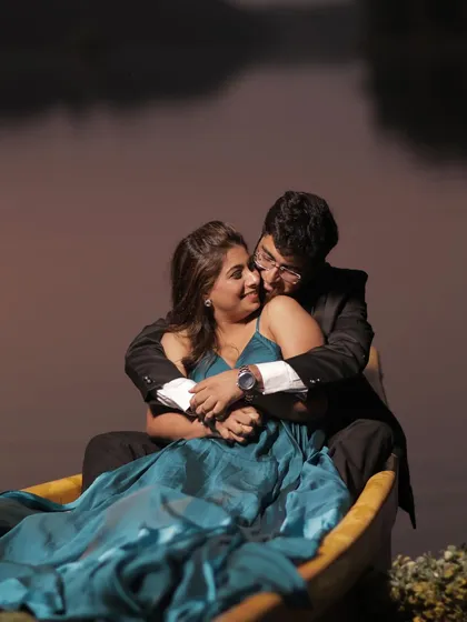 A romantic pre-wedding shoot look designed for an evening setting. I used soft blue shimmers on the eyes and styled her hair in beach waves to complement the flowing gown and the intimate, dreamy atmosphere of the boat scene.