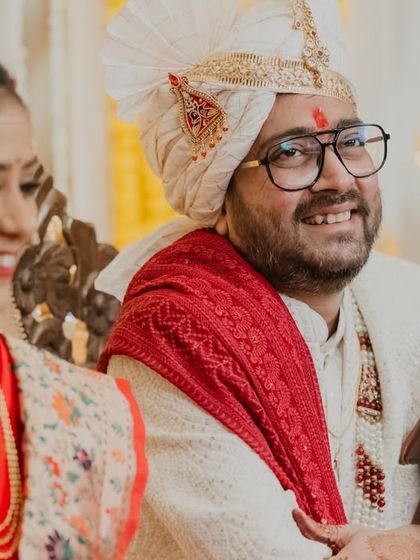 The groom's happy expression during the wedding ceremony. We make sure to capture the joy and emotion of both the bride and the groom.