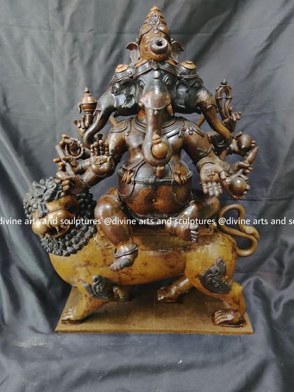 Another view of the intricate Heramba Ganapati wax sculpture. The ten arms and their attributes are clearly defined, ready for the next stage of the casting process.
