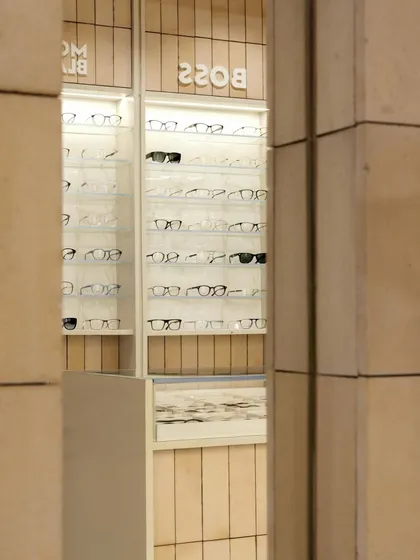 A view from the exterior into the store, showing how the clean, well-lit interior acts as an inviting beacon to passersby.