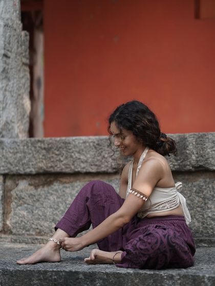 A quiet moment of self-adornment, connecting with my feminine energy. My practice is rooted in self-love and the belief that our bodies are sacred vessels of power and grace.