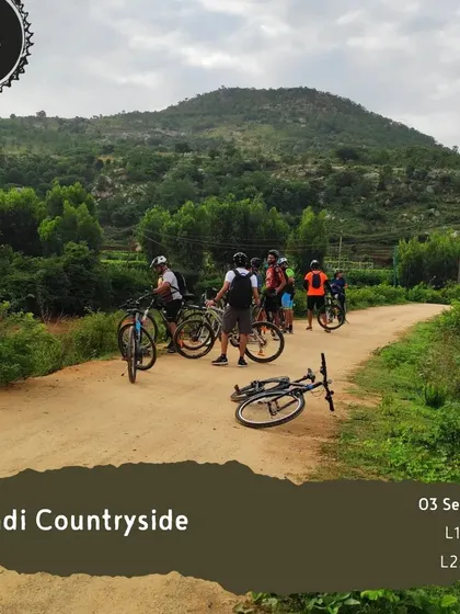 A group takes a break on a dirt road in the Nandi countryside. Our tours are well-paced with plenty of time for rest and photos.