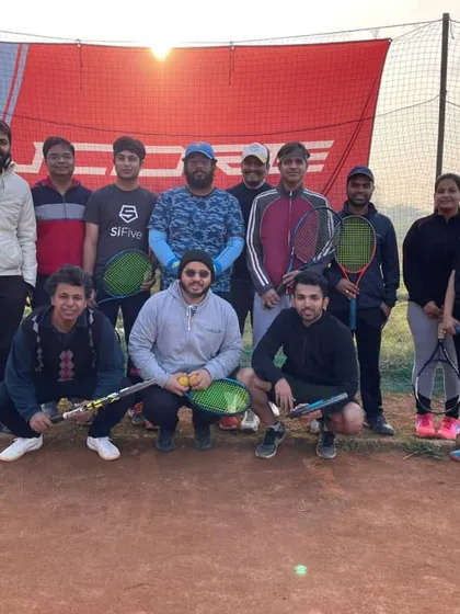 Our adult batch enjoying a crisp morning session on the clay court. Tennis is a lifelong sport, and we've built a fantastic community of players who come here to improve their skills, stay fit, and connect with friends.