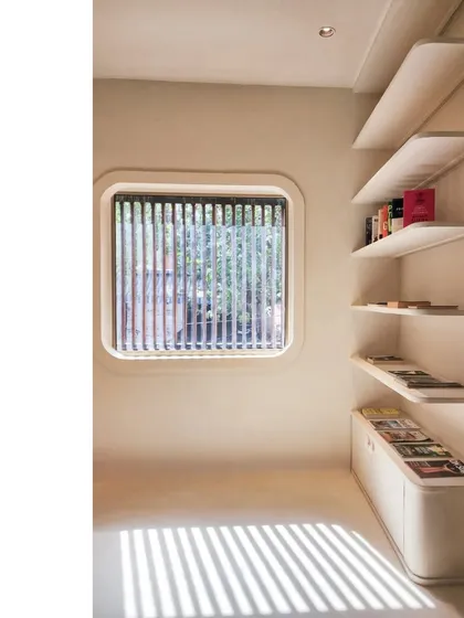 In this media office in Santacruz, Mumbai, a simple moment where design and daylight meet turns the floor into a canvas. The shadow play from the window louvers adds a dynamic, ever-changing pattern to the minimalist, Wabi-sabi inspired interior.