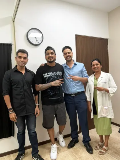 Here is a photo of the artist Vivian "Divine" with me and members of my clinical team. We believe that when the work is real and the results are excellent, the connections we build with our patients are effortless.