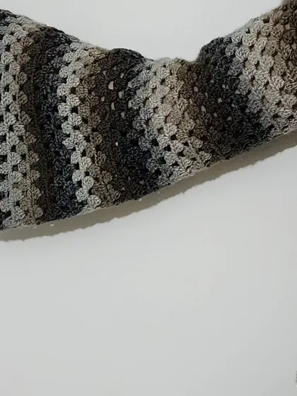 A close-up of the bell sleeve on my Retro Sweater, made with a classic granny stitch.