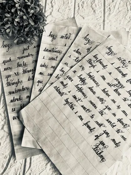 A black and white photo of several handwritten letters, emphasizing the classic and timeless nature of this art form.