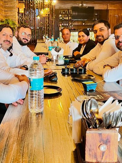 A team lunch to celebrate a birthday. Taking time to connect outside the courtroom is important for our team's morale and unity.