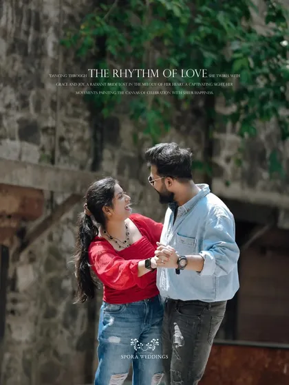 The couple sharing a dance in a sunlit urban setting, a moment capturing "The Rhythm of Love."