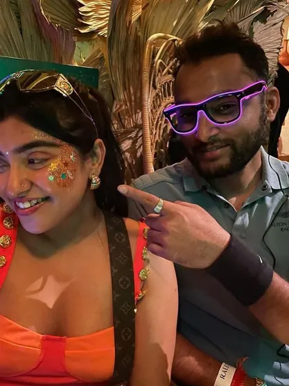 A fun, colorful glitter design with orange and turquoise accents. This look is all about playful energy and good vibes.
