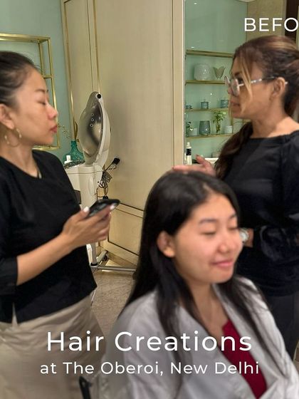 The consultation process is key. Here, our stylists discuss the client's vision before beginning a cut and colour transformation.