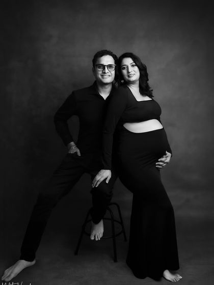 This couple's portrait in black and white feels so classic and cool. It has a timeless, almost vintage quality to it.