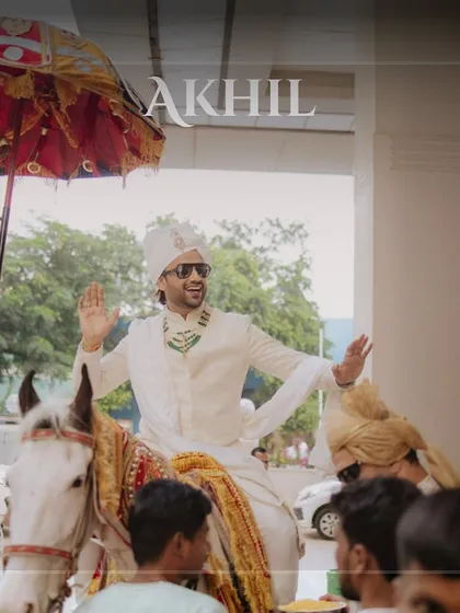 A traditional groom's entry on a beautifully adorned horse. We coordinate all aspects of these classic baraat elements.