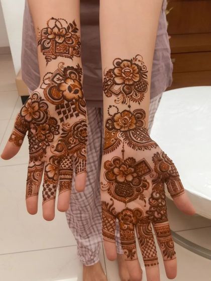 Mehendi Art by Nishat - Mehndi (Henna) Artistry Elegant Henna for Guests & Parties photo 24
