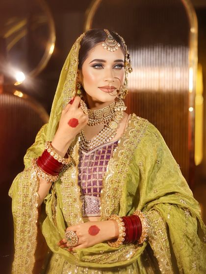 A beautiful Walima bride. The focus here is on flawless skin, sculpted features, and expressive eyes, creating a look of pure elegance.