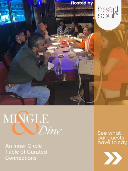 A candid moment from one of our dinner parties. You can see the easy-going atmosphere where guests are engaged in conversation, making real connections over a shared meal.