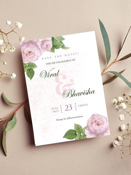 A blooming and beautiful Save the Date for an engagement. This design for Viral and Bhavisha uses soft pink roses and a gentle watercolor background to create a fresh and natural mood.