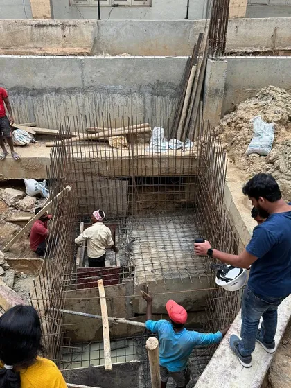 Another angle of the foundation work, showing the steel reinforcement cages. This is the unseen strength of the buildings I create.