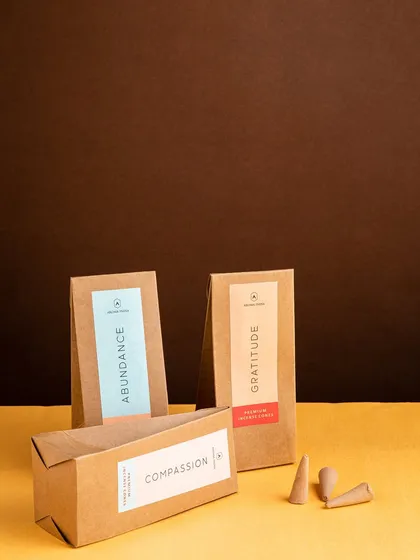 Awaken your senses with the serene aroma of our premium incense cones. This image features our Abundance, Gratitude, and Compassion dhoop cones, perfect for creating a peaceful and positive atmosphere in your home.