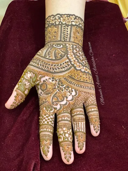 A practice session on a silicone hand. This is how I refine my skills and try out new, intricate designs.