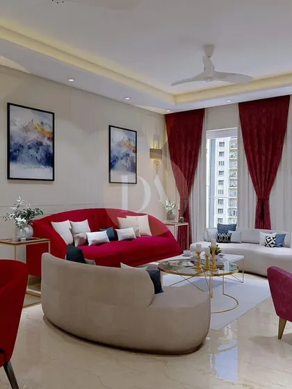 Another perspective of the Gurgaon villa living room, showing the interplay of red and beige furniture. The design feels warm and dramatic, perfect for both relaxing and entertaining.
